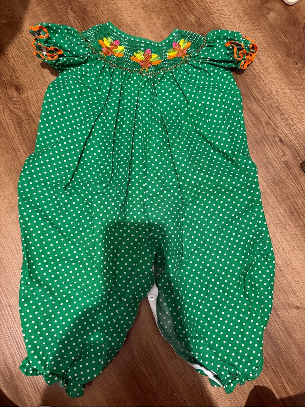 Green Polka Dot Baby Romper with Floral Smocking